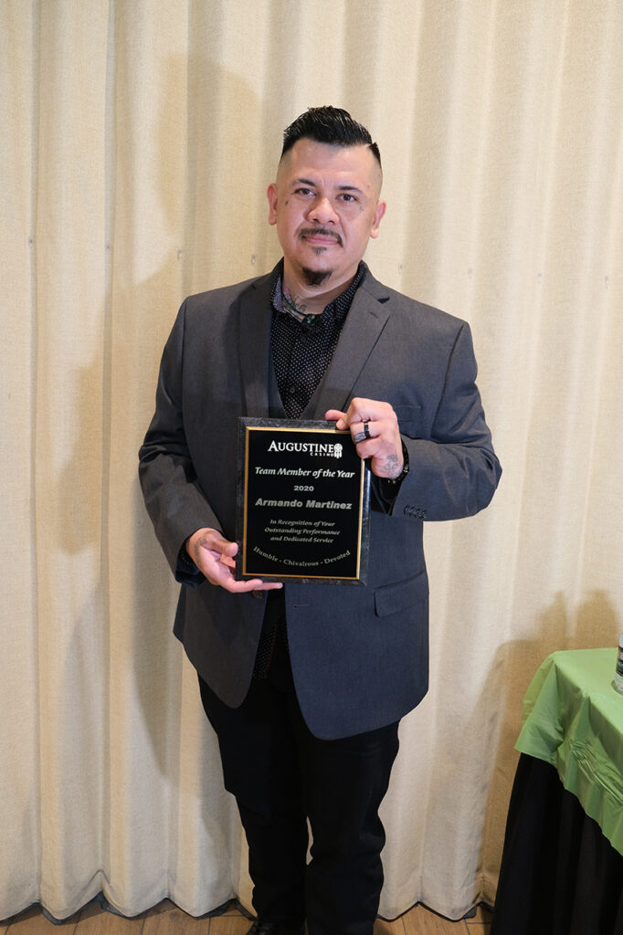 man holding a plaque